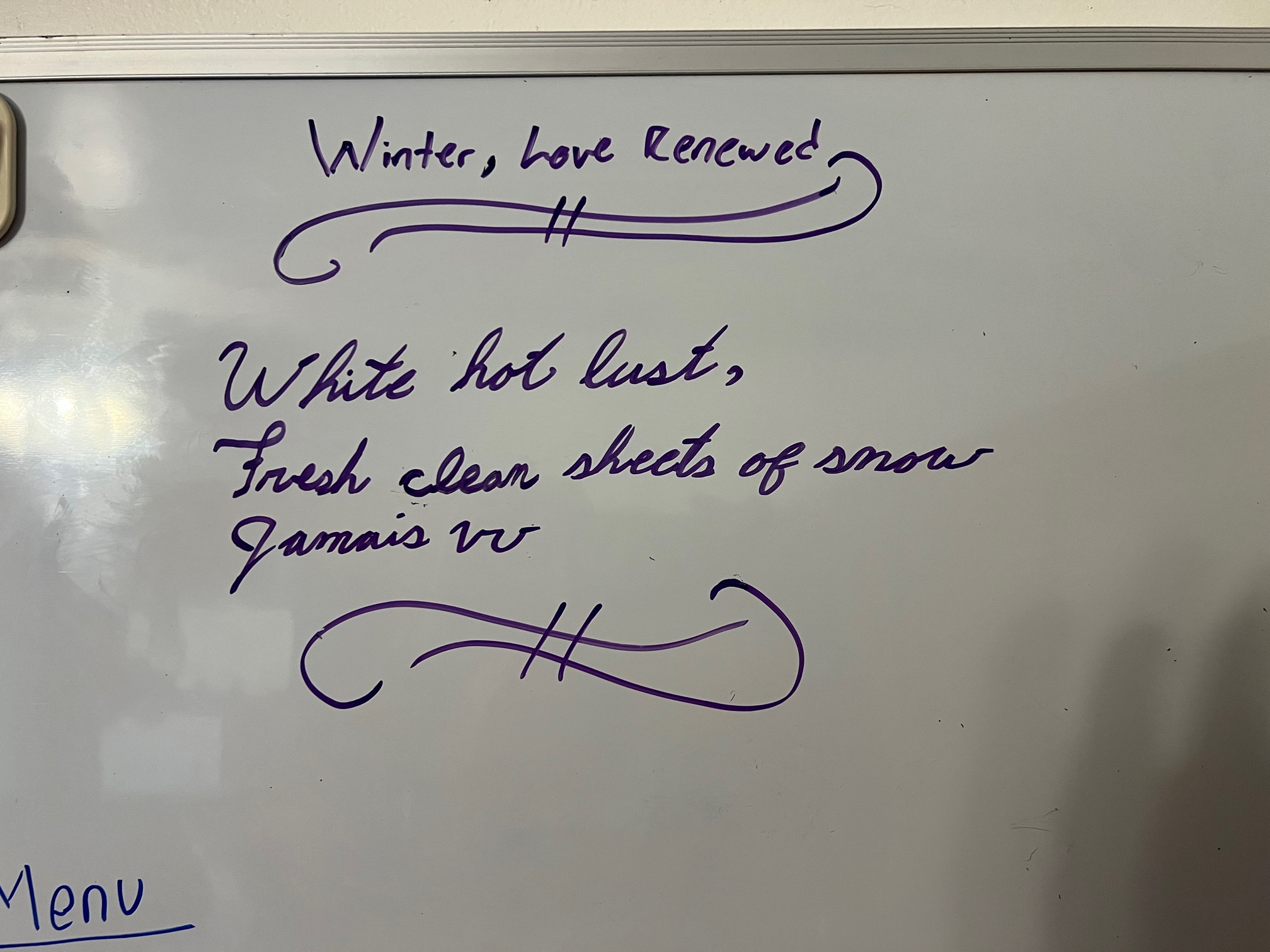 The haiku "Winter, Love Renewed" written on a kitchen whiteboard.